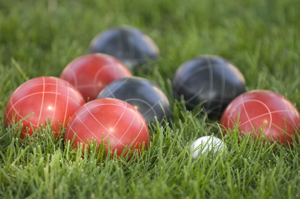 Bocce Ball drinking game on grass